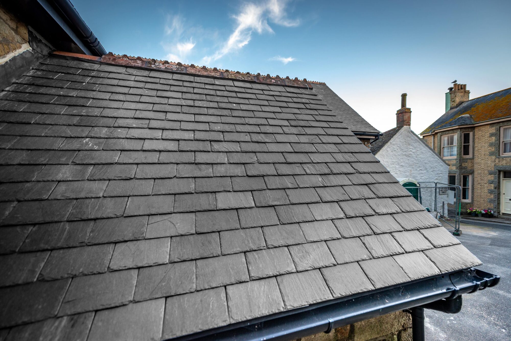 Newly installed grey slate roof on a UK home